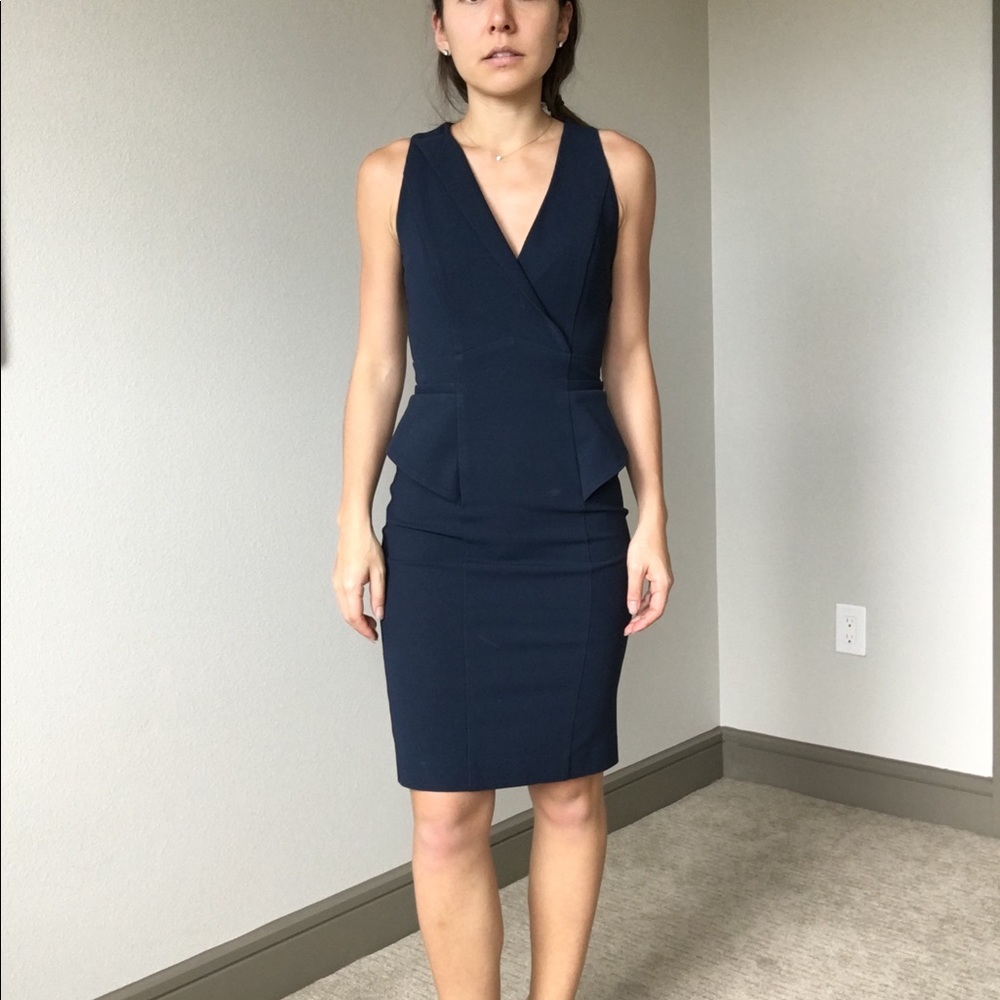 Blue peplum dress size 0 Cue (small burn)
